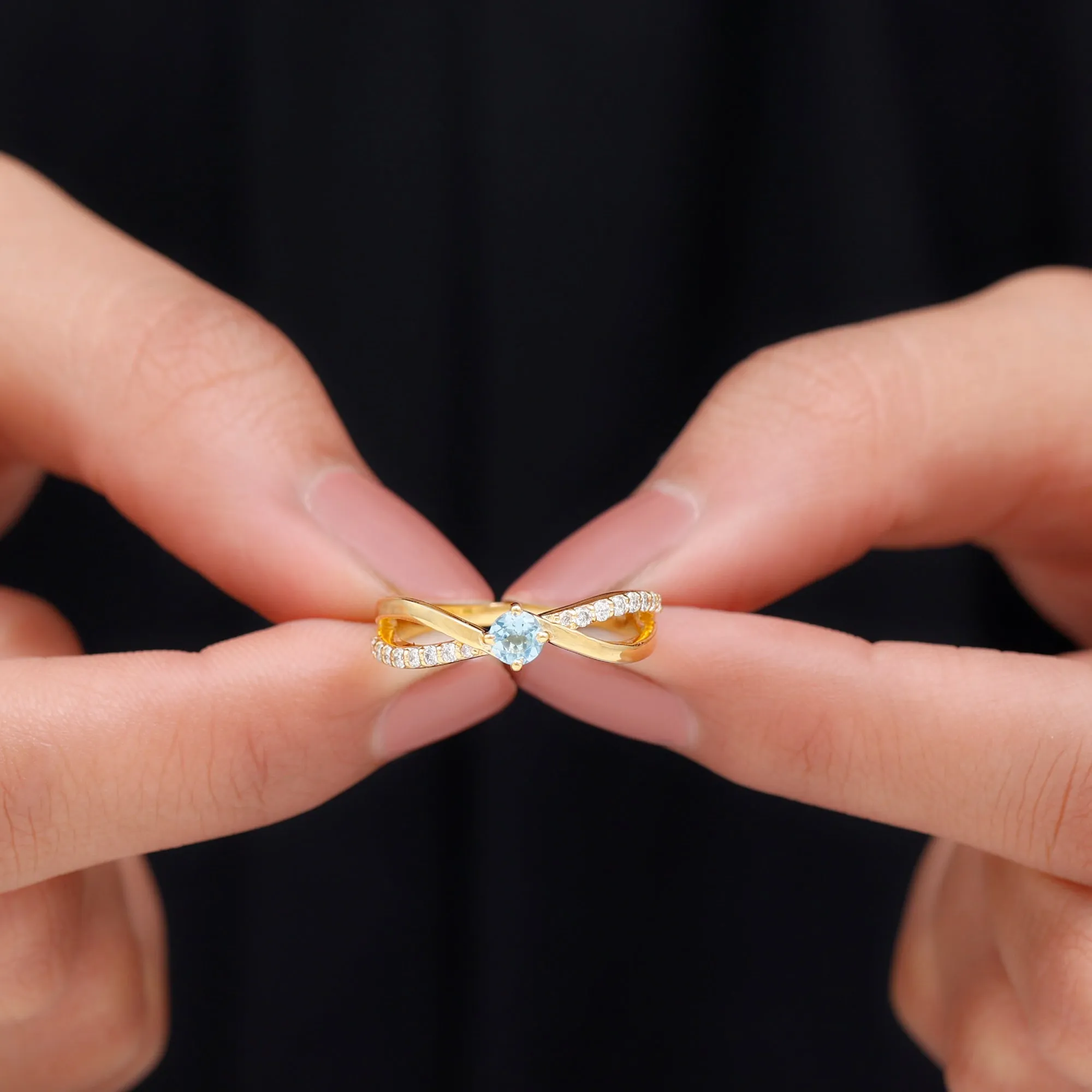 1/2 CT Sky Blue Topaz Solitaire and Diamond Gold Infinity Ring