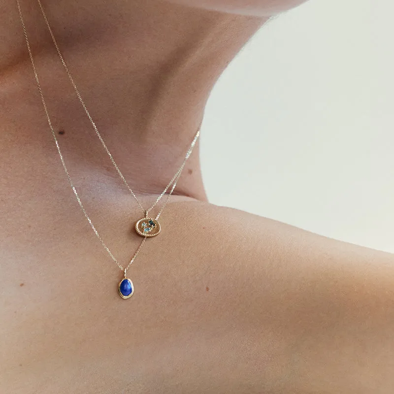 CREATIVITY REIGNS BLUE TOPAZ CHARM