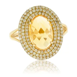 Oval Citrine & Triple Diamond Halo Ring in Yellow Gold