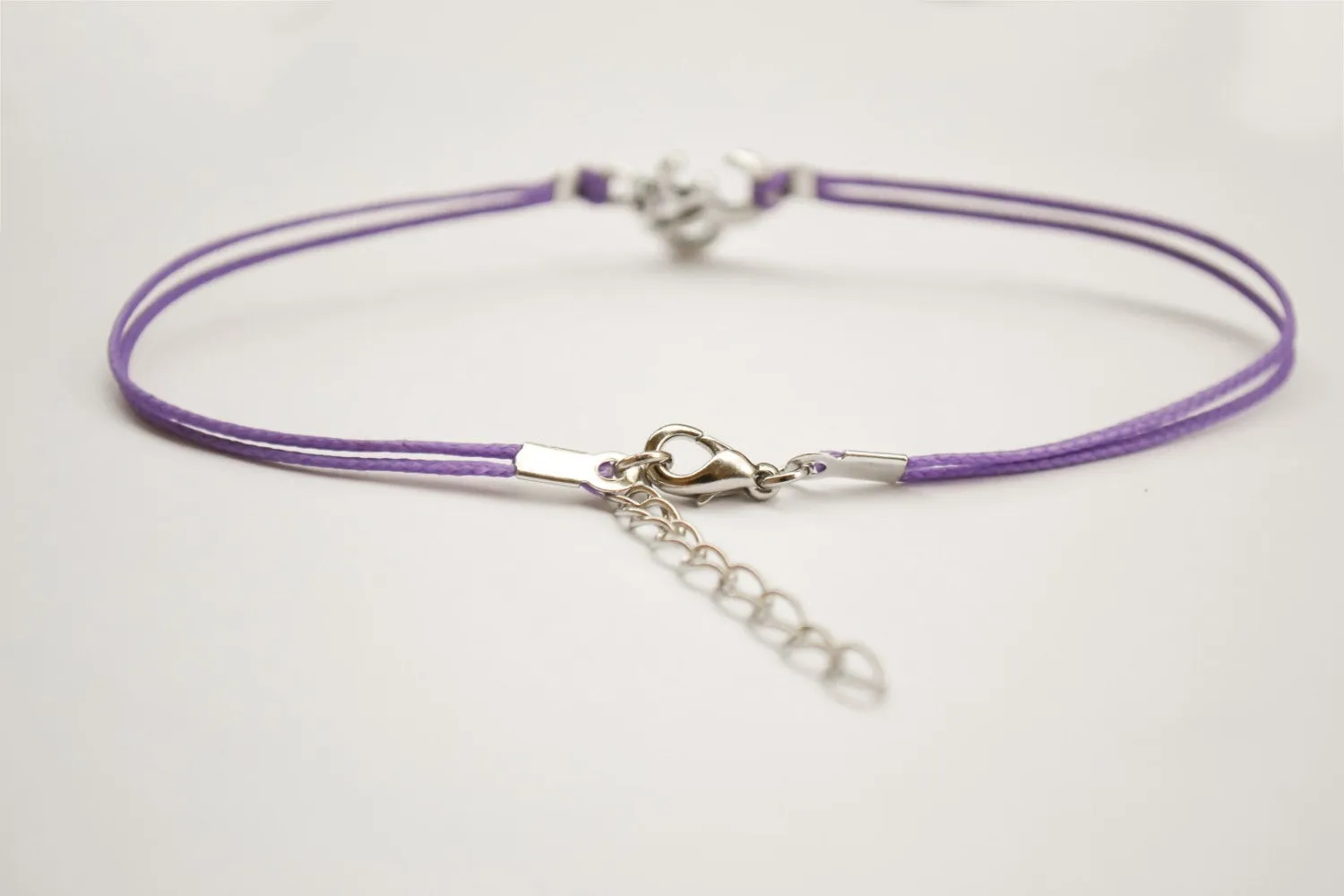 Purple bracelet with silver Om charm, yoga jewelry